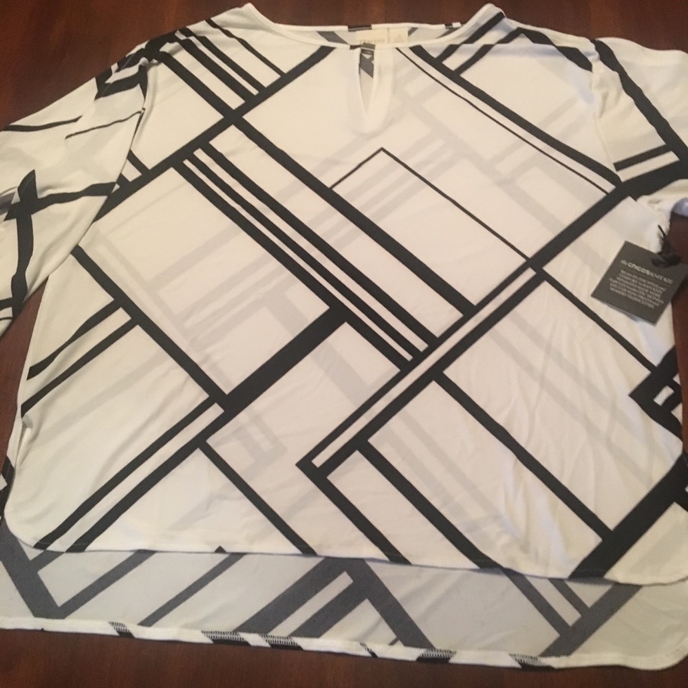 Chico’s black and white split arm top.